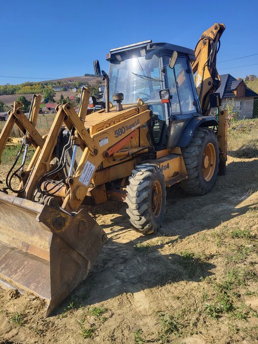 Vand buldoexcavator case 580 sle