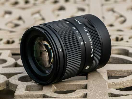 Sony 6700 + Sigma 18-50 f2.8