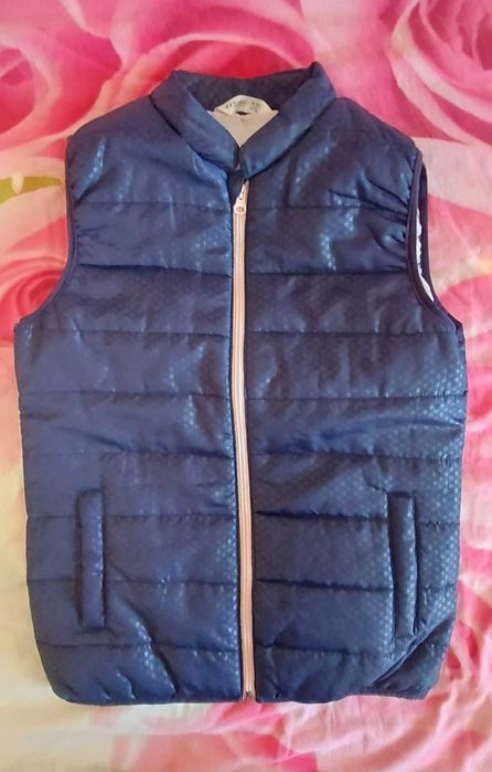 Безрукавка на девочку