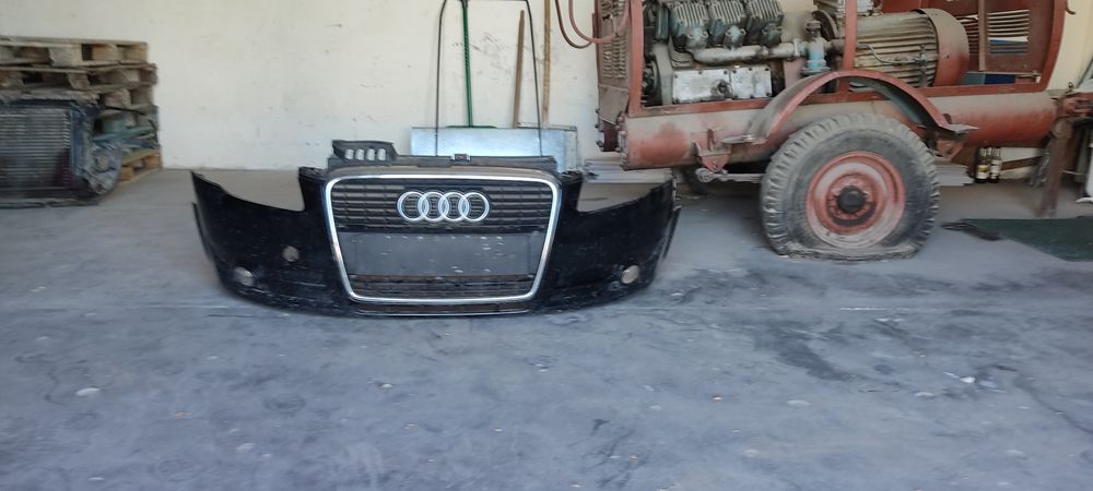 Бампер с решёткой Ауди А4 б7
