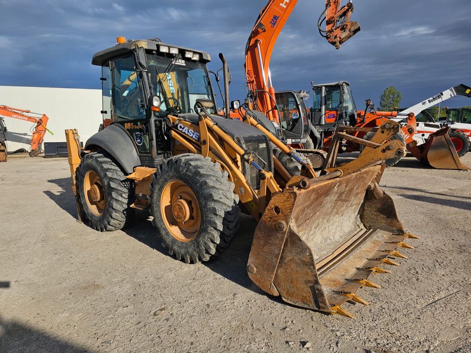 Buldoexcavator case 695 sr
