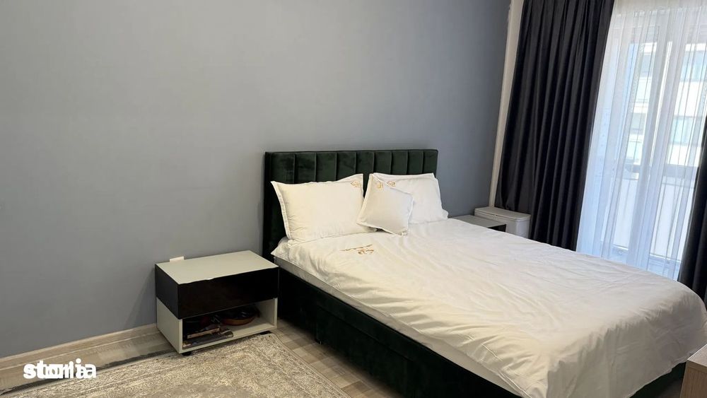 Apartament 2,5  camere, mobilat cu 2 balcoane