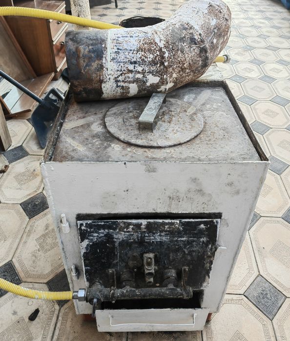 Продам б/у советскую отопительную печь