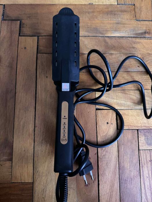 Преса за изправяне на коса