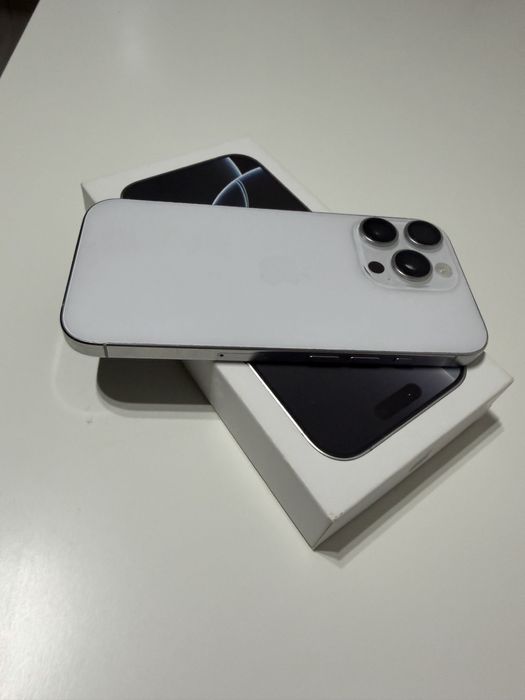 vand iphone 16 pro  alb