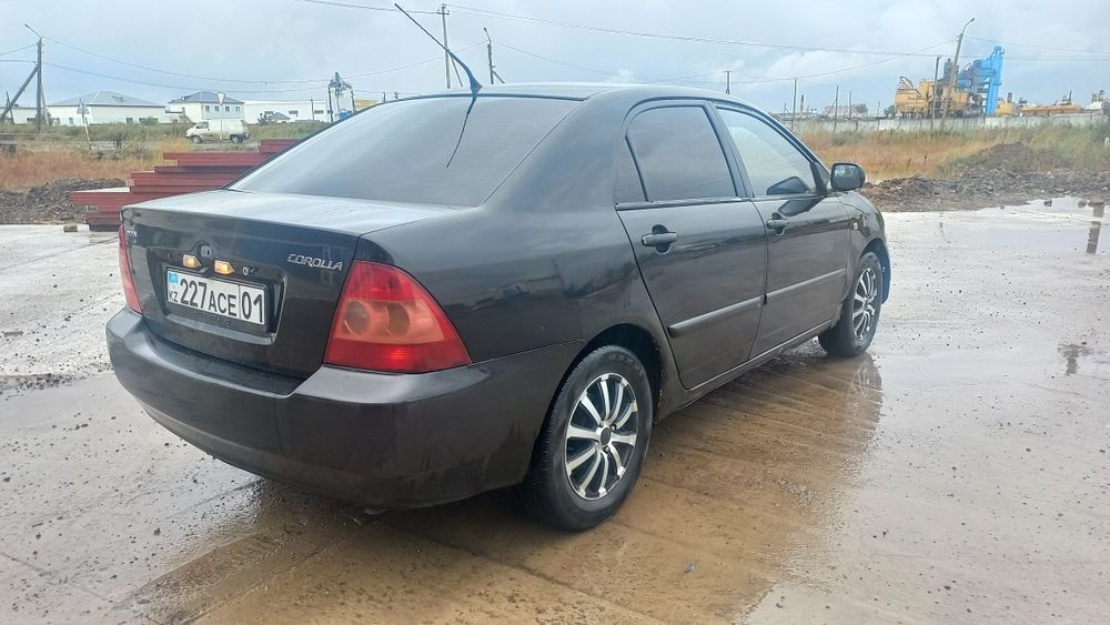 Тойота каролла 2004 г
