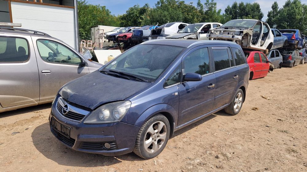 Opel zafira motor cutie faruri capota bara aripa aripi far usi usa portbagaj hayon oglinda scaune interior armatura volan stop stopuri roti jante