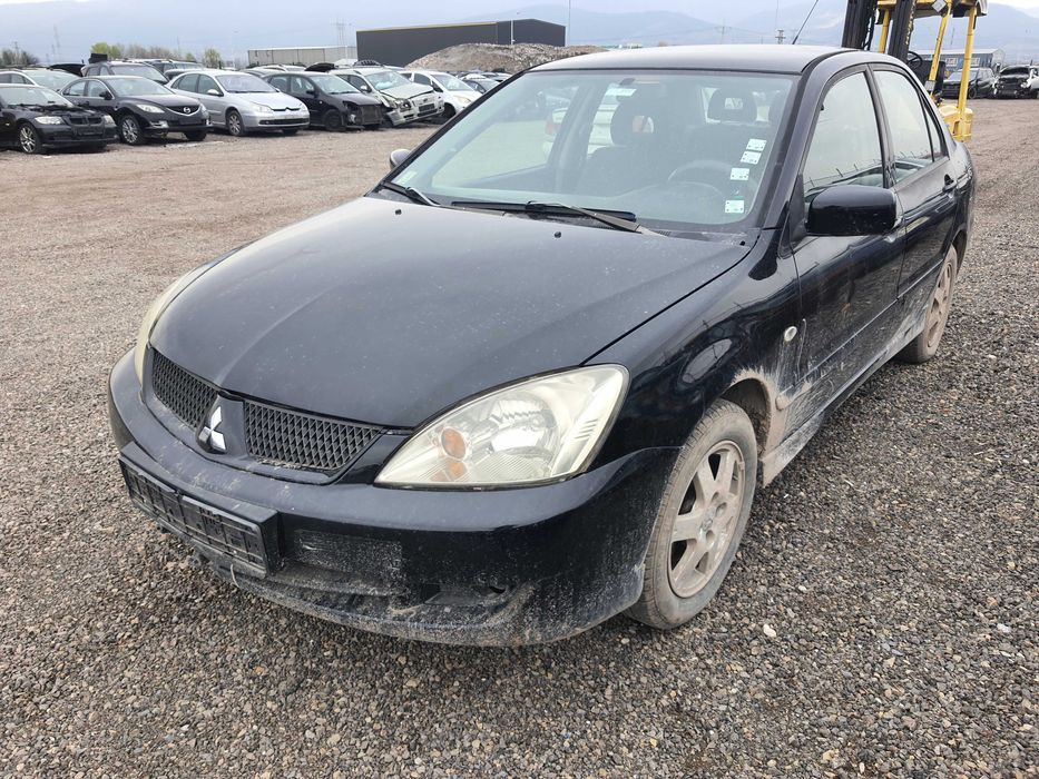 На части! Mitsubishi Lancer 1.6i 16v