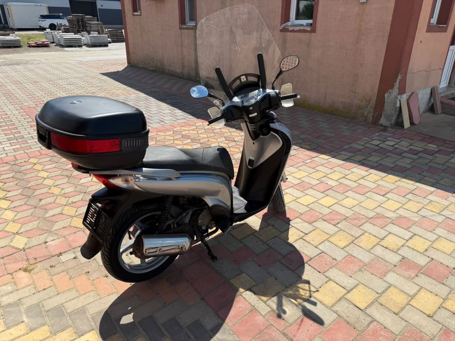 Honda sh 125i 2009 acte Germania se conduce cu categoria B
