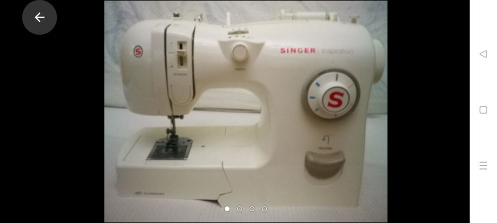 Mașina cusut singer.
