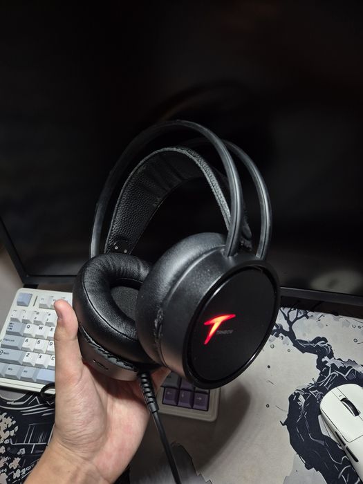 Продам наушники Tanbow C3U