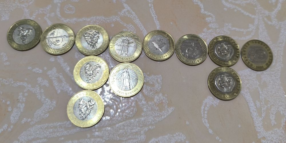 Манеты сто тенге