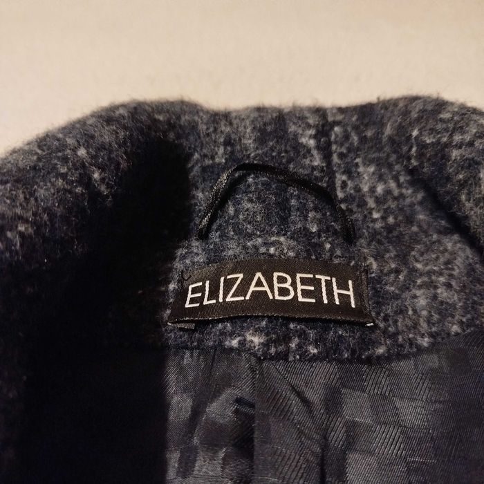 Елегантно дамско палто