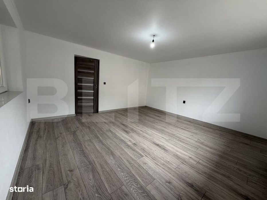 Casa cu 2 camere si un teren de 1000 mp