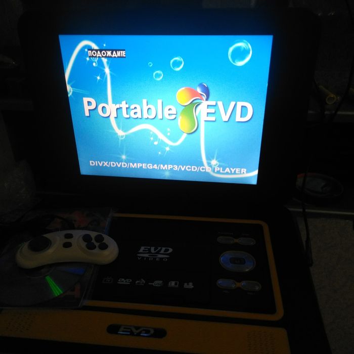 Портативный двд EVD