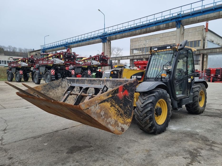 Încărcător telescopic Caterpillar TH408D