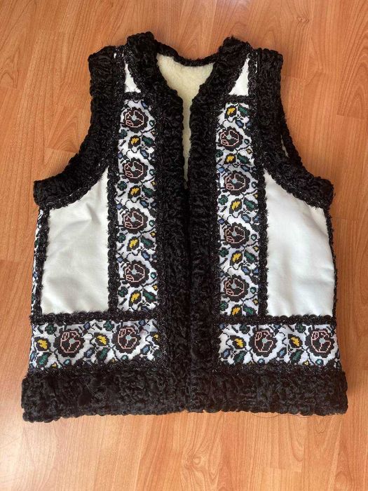 O să vând o vestă. cu ridicata si cu amanuntul