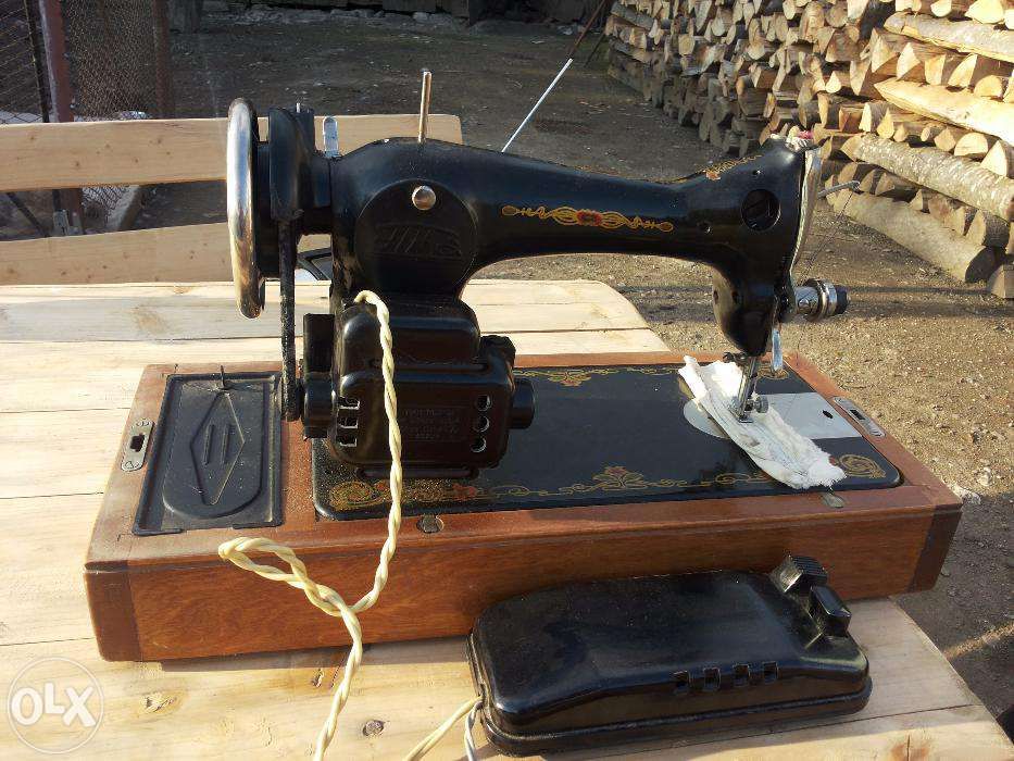 Masina de cusut electrica Ruseasca