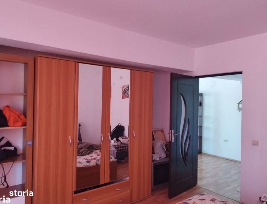 Apartament modern, două balcoane,parcare, living cu bucătărie,dormitor