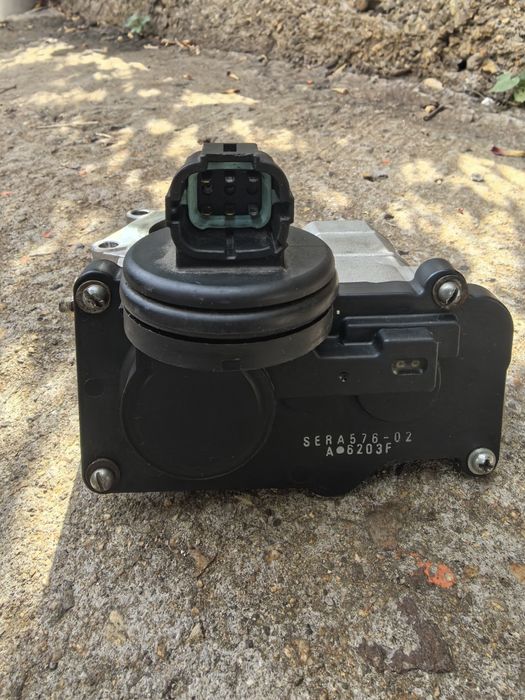 Дросел за Nissan note/micra