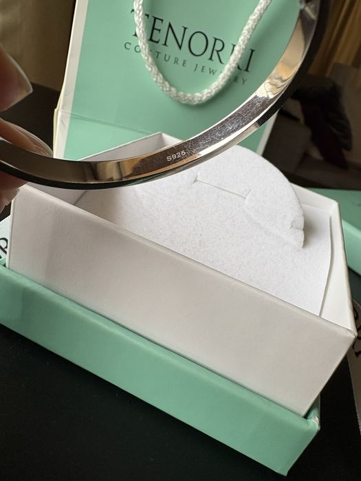 Сребърна гривна Cartier.