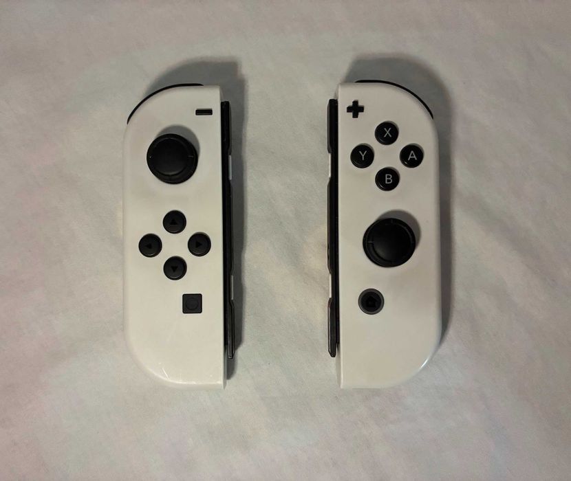 Vand Nintendo Switch Oled stare noua cu 2 jocuri