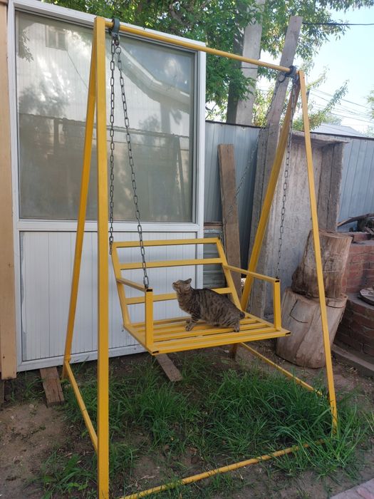 Продам  качели новый