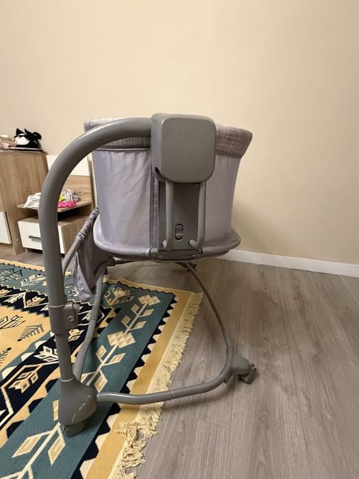 Манеж-качалка электрическая