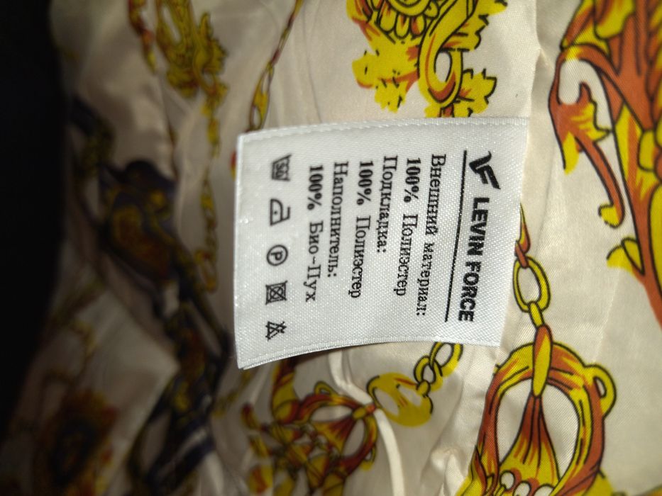 Продам пуховик женский.