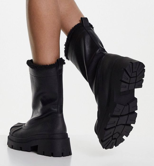 Продам сапоги новые