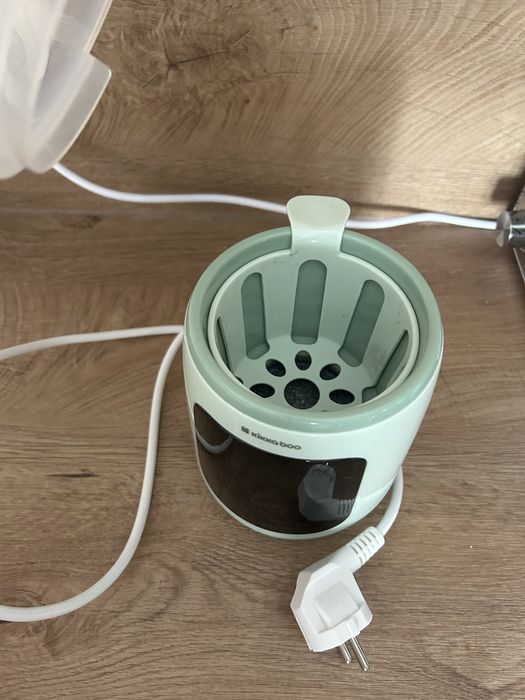 Уред за преваряване или топлене на бебешко мляко/храна