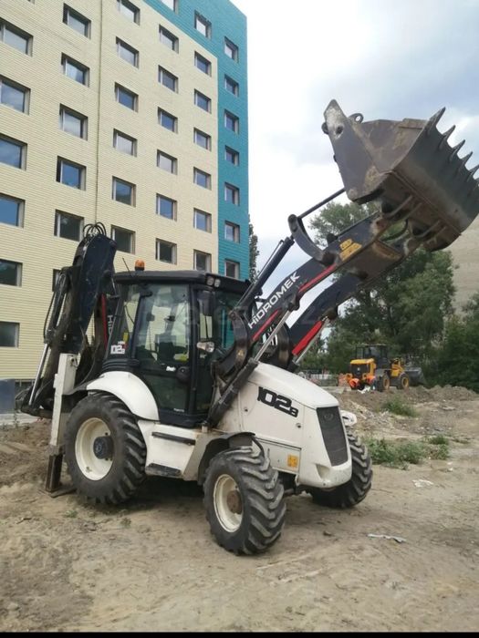 Услуги Экскаватор погрузчика