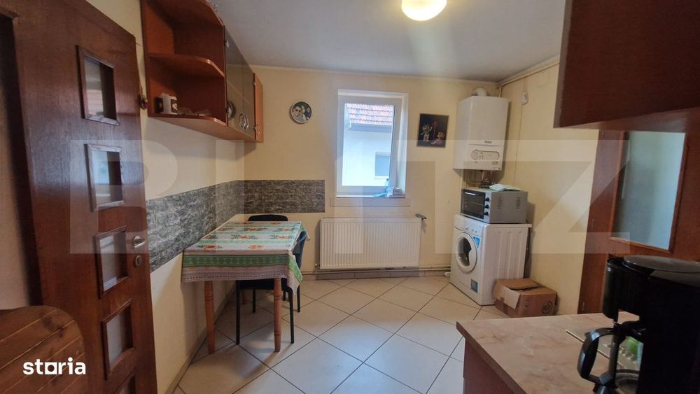 Casa cu teren 935 m , doua corpuri de case, Sacele -zona buna