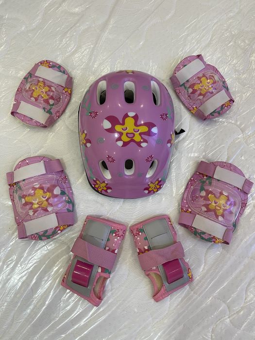 Роликовые коньки