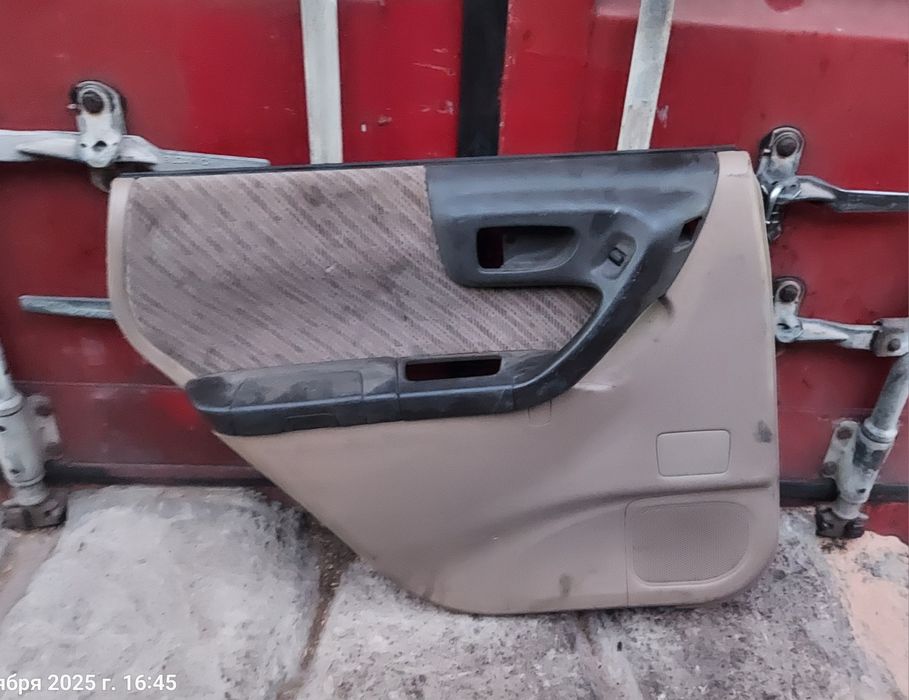 Обшивка двери Субару Форестер SF