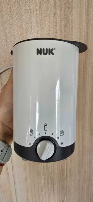 Нагревател за шишета и бурканчета NUK 3 в 1 в отлично състояние.