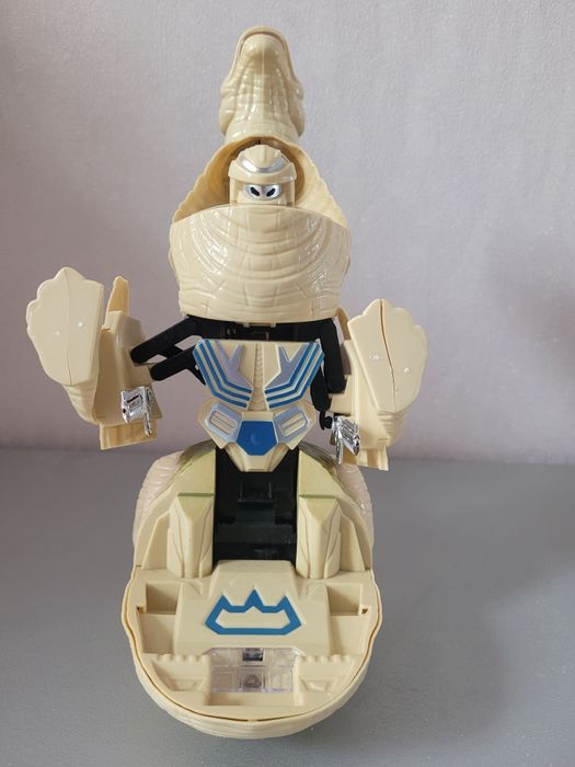 Динозавр робот трансформер