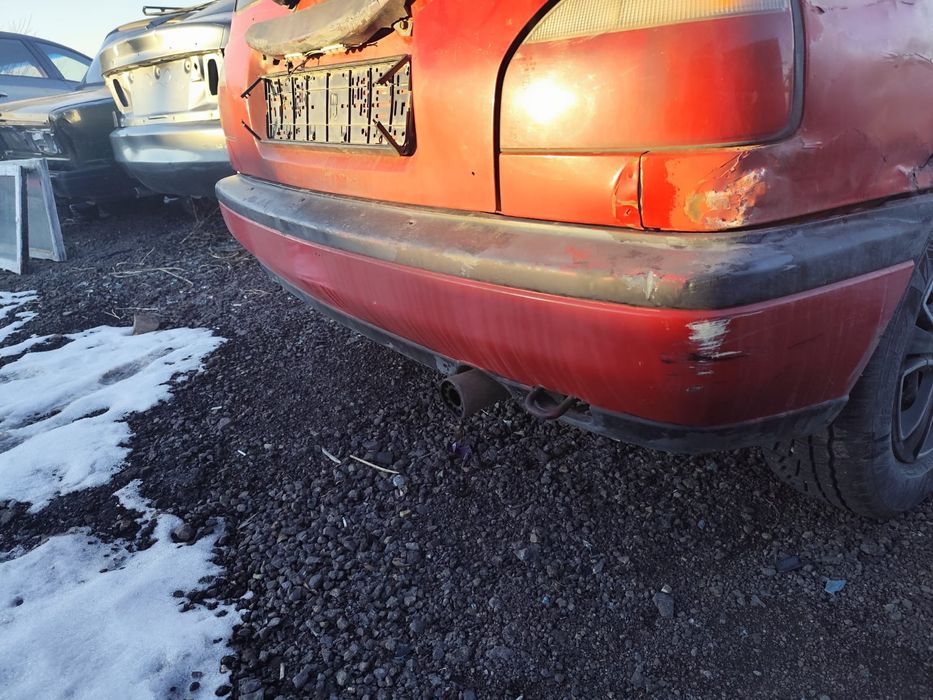 Бампер задний Ниссан Санни