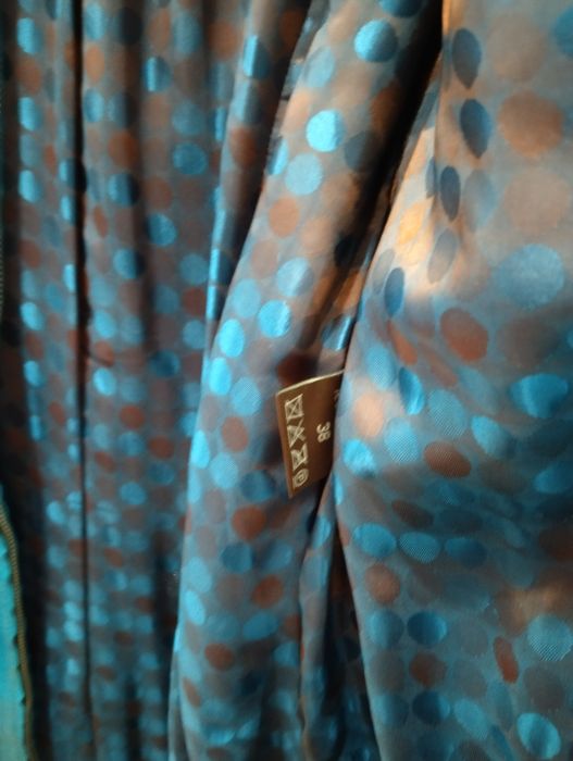 Кожаный плащ в хорошем состоянии