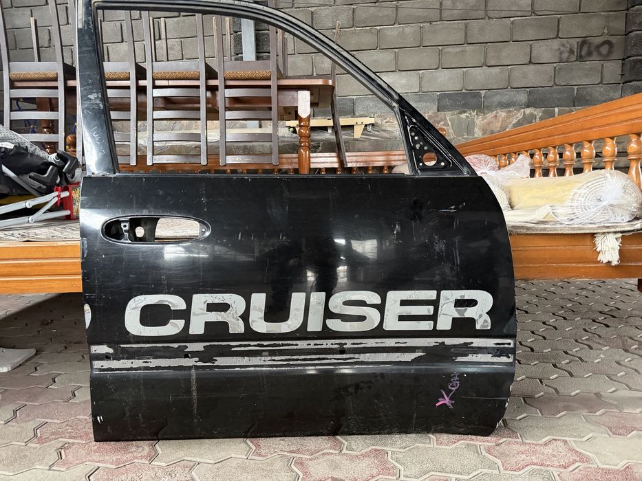 Двери и крыло от крузака 100