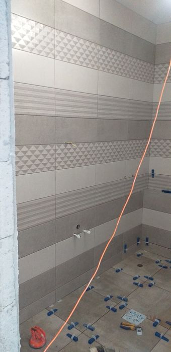 Echipa specializată în amenajări exterioare si renovari interioare