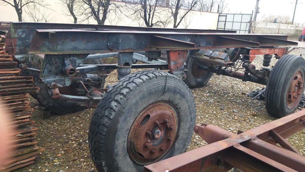 Remorca 12 tone, cu un  cilindru, basculare pe trei parti