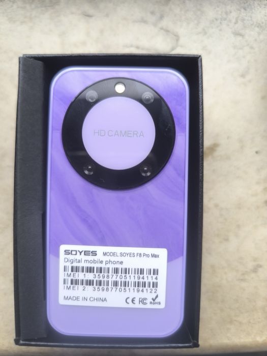 Детски телефон лилав нов