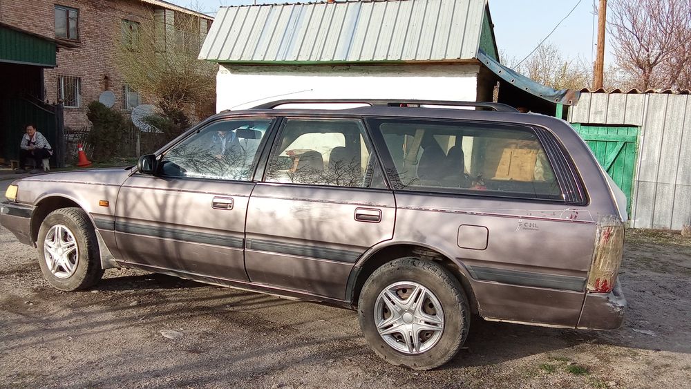 Мазда универсал.