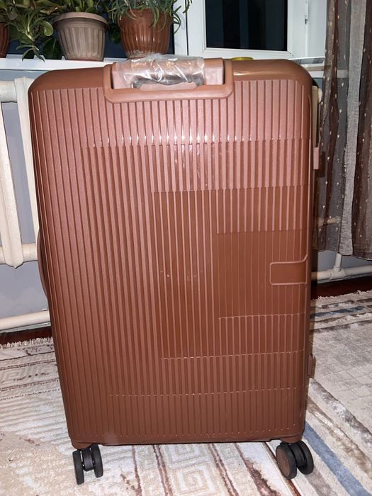 Жаңа стильді чемодан