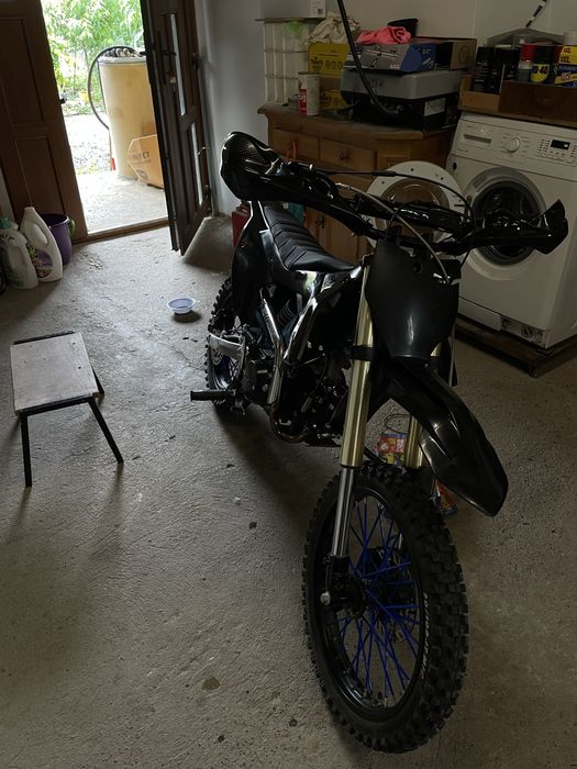 Cross 125cc in 4 timpi