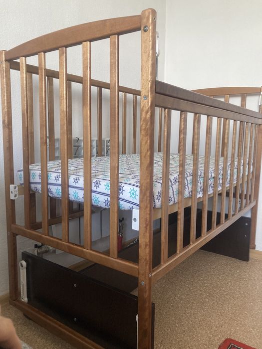 Детская кроватка маятник
