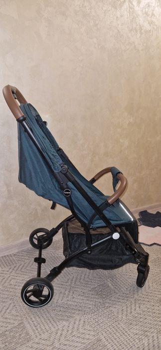 Продам прогулочную коляску Tomix Luna Lux