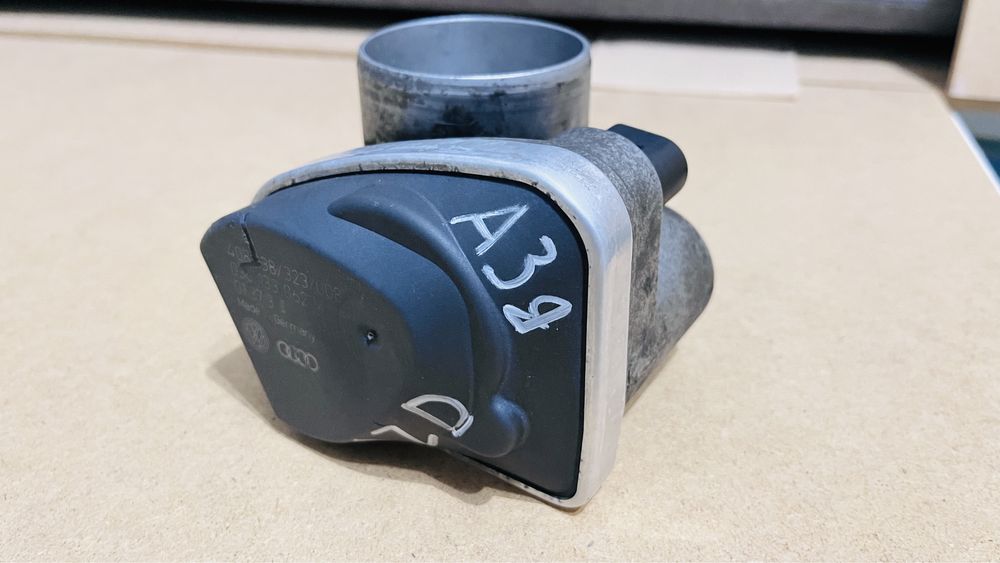 Дросешьная заслонка Гольф 4