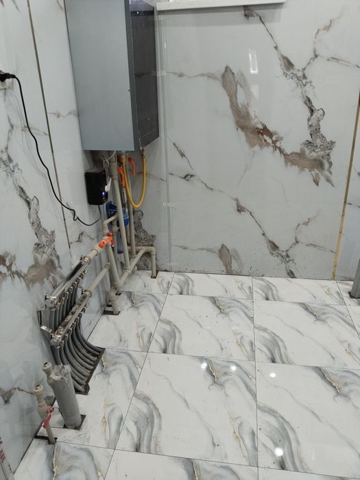 Кафельшик плиточник